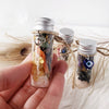 Witchcraft ritual spell jar for protection talisman with crystals and herbs
